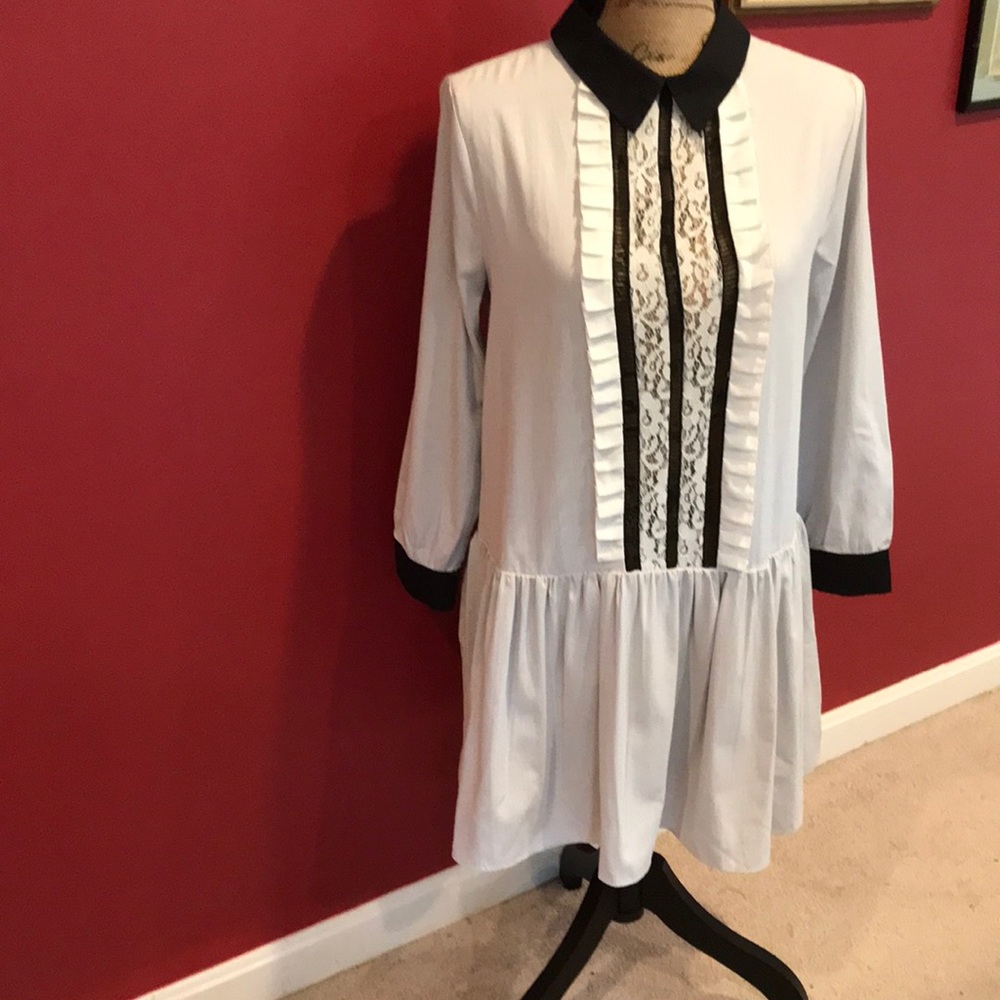 Think afternoon tea and this is the perfect dress for that. Darling lace bodice.